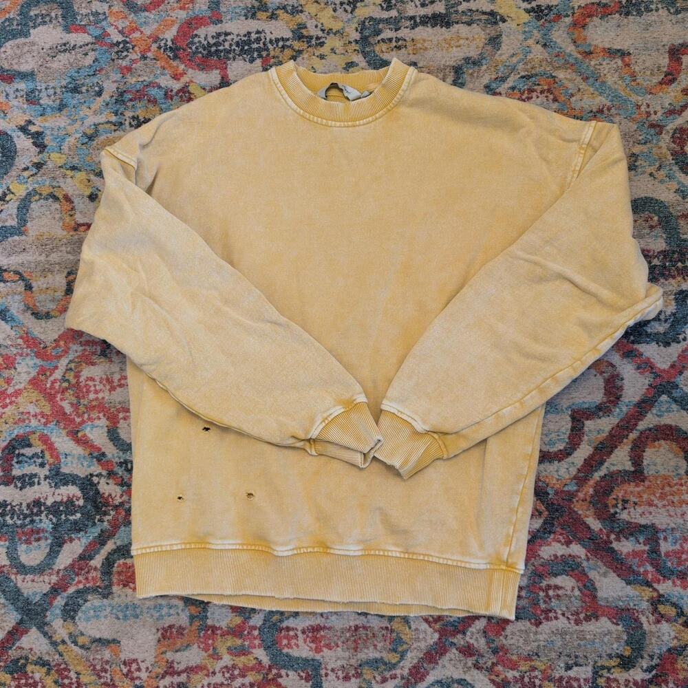Yellow falling forward distressed crewneck